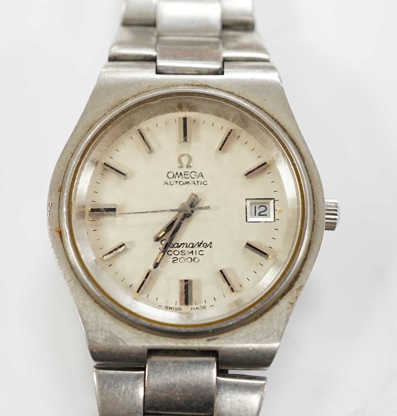 A gentleman's stainless steel Omega Seamaster Cosmic Automatic wrist watch, with baton numerals, on a stainless steel Omega bracelet, no box or papers.